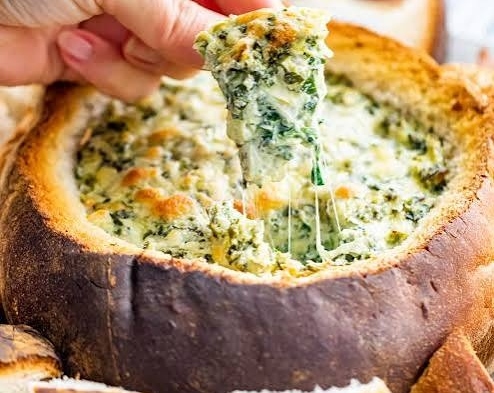 Ultimate Game Day Spinach Artichoke Dip Bread Bowl suggested serving
